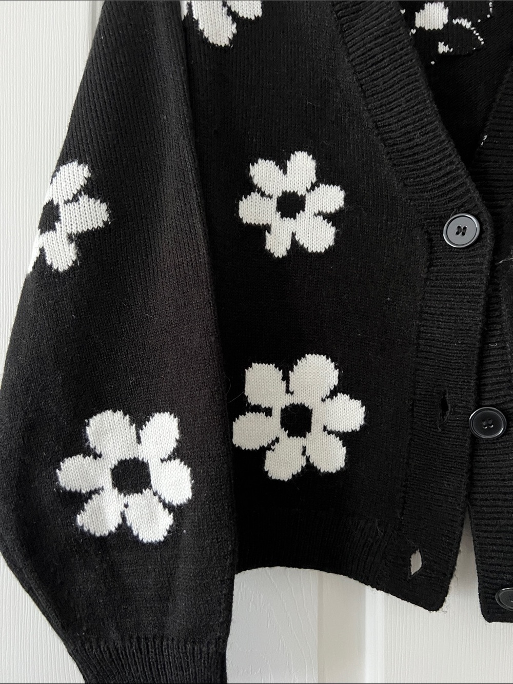 Divided Black Cardigan Sweater with White Floral Motif - Picture 2 of 4